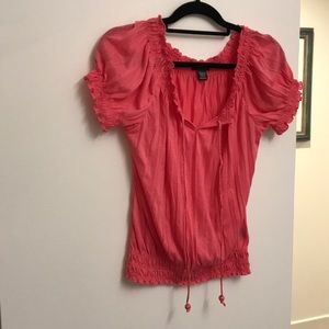 Pink ruffled shirt with ties and cinched bottom